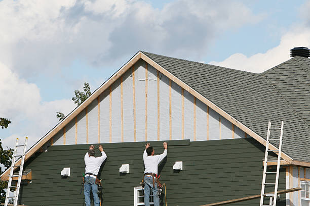 Professional Storm Damage Siding Repair technician working in North Wilkesboro, NC